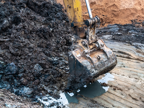 close-up of the excavator bucket while working